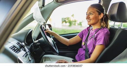 Caucasian Female Doctor Driving Her Car. Young Smiling Nurse Driving Home After A Day's Work.