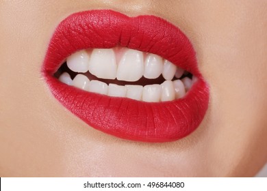 Caucasian female grinding her teeth