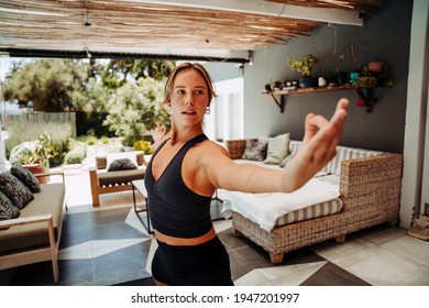 Caucasian Female Stretching Practicing Yoga Outside Home