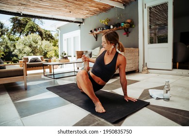 Caucasian Female Stretching Practicing Yoga Outside Home