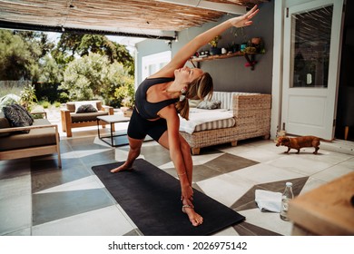 Caucasian Female Teen Practicing Yoga Outside Home Stretching For Exercise 