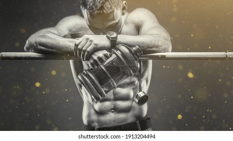 Caucasian Fitness Man Drinking Water After Workout In Gym. Fitness And Bodybuilding Healthy Background. Nutrition And Health Care Concept