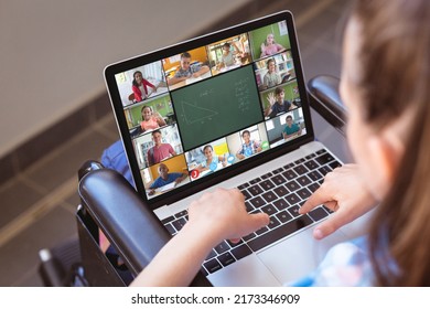 Caucasian Girl Attending Online Class Over Video Call On Laptop While Sitting On Wheelchair At Home. Disability, Internet, Unaltered, Childhood, Wireless Technology, Education, Student, E-learning.