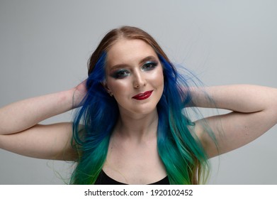 Caucasian Girl With Dyed Hair On A White Background