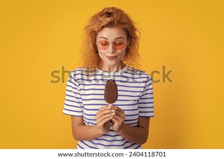 caucasian girl with icelolly ice cream on background. photo of girl with icelolly ice cream