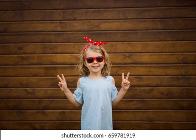 Caucasian Girl Making Peace Sign