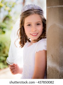 Caucasian Girl Wearing First Holy Communion Dress. Outdoors.