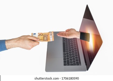 A Caucasian Hand Hands Over A € 50 Bill To Another Hand Coming Out Of The Laptop. It Can Represent An Online Transaction As Tax Payment Or Online Extortion.