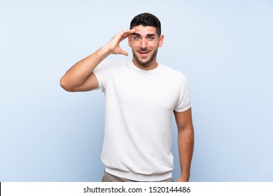 Caucasian handsome man over isolated blue background has just realized something and has intending the solution - Shutterstock ID 1520144486