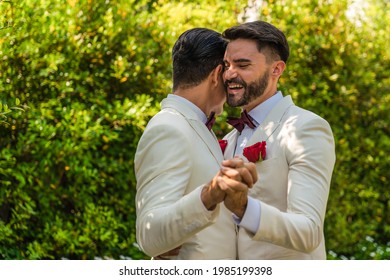 Caucasian LGBTQ Gay Couple Having Goodtime Dancing Together In Garden In Wedding Ceremony And Marriage Celebration. Concept Of LGBTQ Same Sex Relation