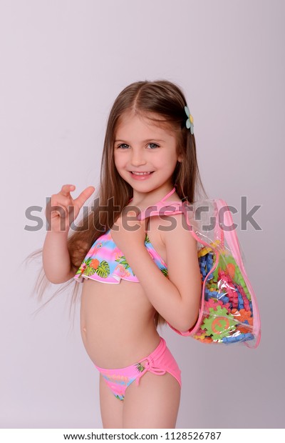 young girl in swimsuit