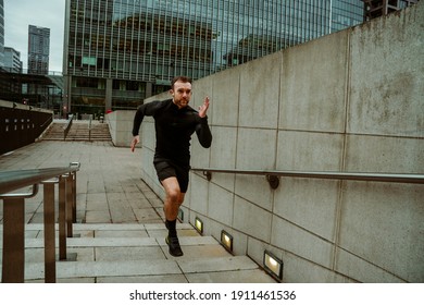 Caucasian Male Athlete Training Running Up City Stairs Training Cardio Fitness For Upcoming Marathon Race