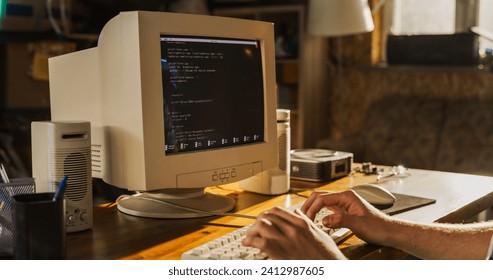 Caucasian Male College Student Using Old Desktop Computer In Nineties Retro Garage. Young Programmer Connecting World Wide Web Via Early Internet Software, Exploring Global Network. - Powered by Shutterstock - Get 15% off with code: PIKWIZARD15