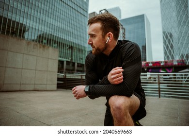 Caucasian Male Fitness Coach Training Listening To Music With Airpods 