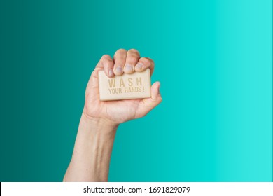 Caucasian Male Hand Holding Bar Of Soap With Message 