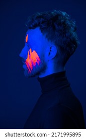 Caucasian Male Model With Blacklight Paint.