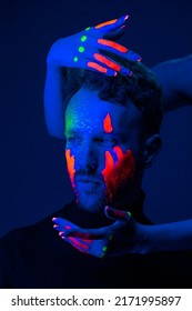 Caucasian Male Model With Blacklight Paint.