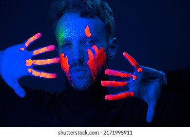 Caucasian Male Model With Blacklight Paint.