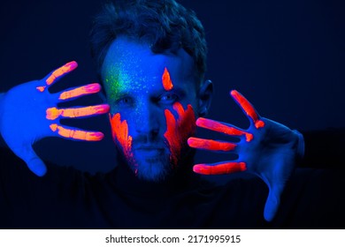 Caucasian Male Model With Blacklight Paint.