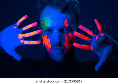 Caucasian Male Model With Blacklight Paint.