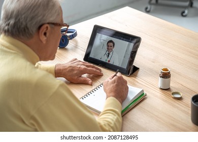 Caucasian male therapist sharing information and provide support at the video conference - Powered by Shutterstock