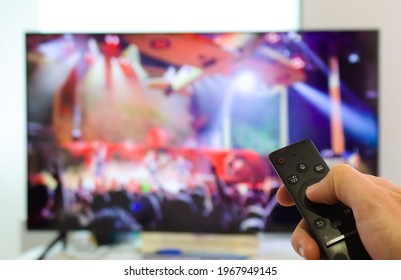 Caucasian Male Watching Television Resting In The Bed And Switching Channels Virtual Gig Concert Horns Up Live