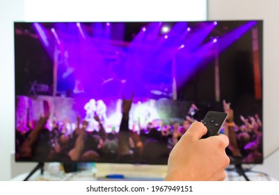 Caucasian Male Watching Television Resting In The Bed And Switching Channels Virtual Festival Gig Concert Horns Up