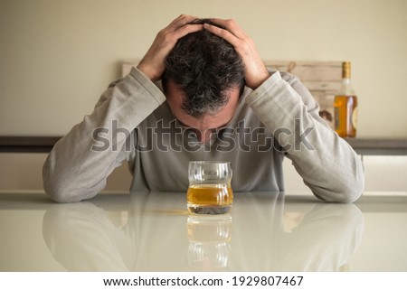 caucasian man addicted to alcohol