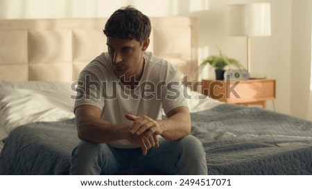 Caucasian man bored male unhappy guy home bedroom routine problems debts bankruptcy loneliness unwell unhealthy stress exhaustion tired exhausted frustration upset reflection thoughtful burnout crisis