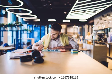 Caucasian Man Drawing Statistic Diagram During Online Web Exchange Of Money Bitcoin Using Electronic Pen Indoors, Millennial Male Trader Browsing Internet For Analyzing Revenue During Distance Job