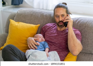 Caucasian man father talking on mobile phone for online cooperate working with holding his sleeping newborn baby son. Single dad caring his infant child boy. Happy family and working at home concept. - Shutterstock ID 1894151851