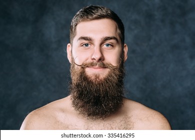Caucasian Man With Funny Spinning Mustache And Big Beard. Horizontal
