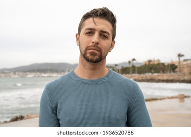 Caucasian Man Looking At Camera By The Sea. Palma De Mallorca, Spain