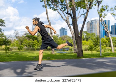 Caucasian man in sportswear stretching body and warm up before jogging exercise at public park in the morning. Healthy guy athlete enjoy outdoor lifestyle sport training running workout in the city. - Shutterstock ID 2276922473