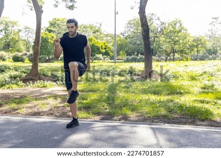 Similar – Image, Stock Photo Young man stretching in the city after jogging