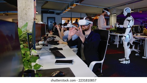 Caucasian man in VR glasses moving hands in air. Male in headset having virtual reality experience. Moving hands in air. Futuristic. Augmented. Robot on the background. Android. Humanoid