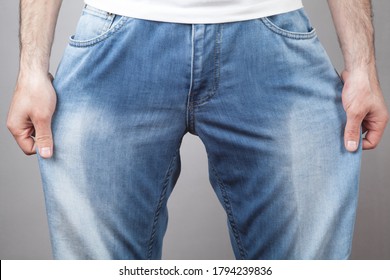 Caucasian Man In Wet Jeans. Urinary Problem