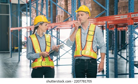 Caucasian Man, Woman Warehouse Supervisor Wear Safety Discuss,talk And Use Clipboard Check Box Package On Shelf, Product Distribution Inventory Management,Logistics Shipping Business Planning Industry