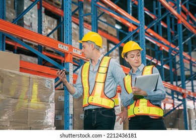 Caucasian Man, Woman Warehouse Supervisor Wear Safety Discuss,talk And Use Clipboard Check Box Package On Shelf, Product Distribution Inventory Management,Logistics Shipping Business Planning Industry