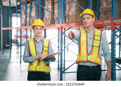 Caucasian Man, Woman Warehouse Supervisor Wear Safety Discuss,talk And Use Clipboard Check Box Package On Shelf, Product Distribution Inventory Management,Logistics Shipping Business Planning Industry