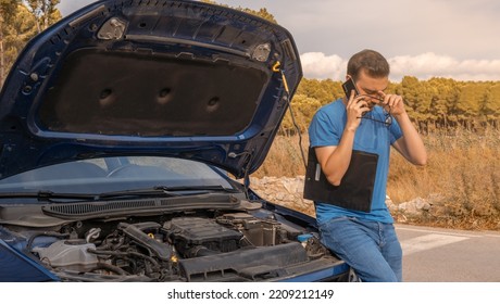 Caucasian Man With Worried Expression, Sitting In Car, Calling Auto Insurance Company. Horizontal Photography With Copy Space.