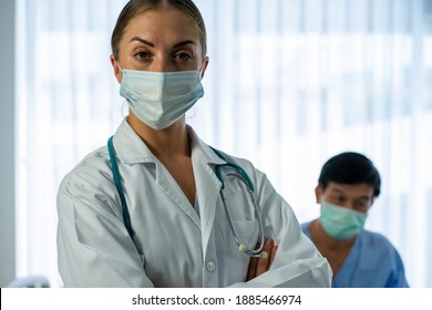 Caucasian medical physician in hospital diagnosis old senior Asian patient from virus pandemic - Shutterstock ID 1885466974