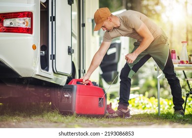 Caucasian Men Firing Portable Inverter Generator Connected To His Motor Home RV. Summer Camping Power Supply.