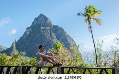 Caucasian Men And A View At The Pitons Of St Lucia Saint Lucia, Men Hiking In The Mountains Of Saint Lucia Caribbean, And A Nature Trail In The Jungle Of Saint Lucia. 