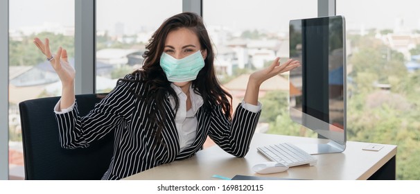 Caucasian Office Businesswoman Feel Confident Wearing Medical Mask During Working For Coronavirus Covid 19 Protection, New Normal Practise Of Working In Coronavirus Covid 19 Pandemic Situation