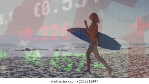 Caucasian professional woman is walking on beach holding surfboard. She has blonde hair, wearing bikini, and stock market numbers overlay scene - Powered by Shutterstock