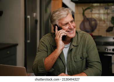 Caucasian Senior Male Chatting On Cellular Device 