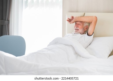 Caucasian Senior Man Feeling Sick And Unwell Lying In Bed After Wake Up In The Morning