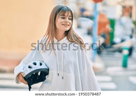 Similar – Schöner Teenager mit Helm zum Reitenlernen