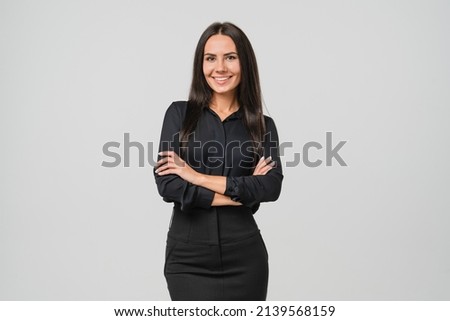 Photo of Caucasian successful confident young businesswoman ceo boss bank employee worker manager with arms crossed in formal wear isolated in white background